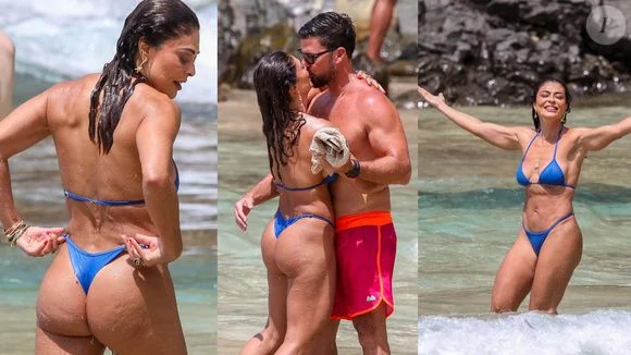 Gata, bronzeada e cheia de amor! De biquíni fio-dental, Juliana Paes dá ‘beijo de cinema’ no marido em Noronha; corpo definido rouba cena